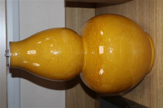 Three Chinese yellow ground vases Tallest 35cm
